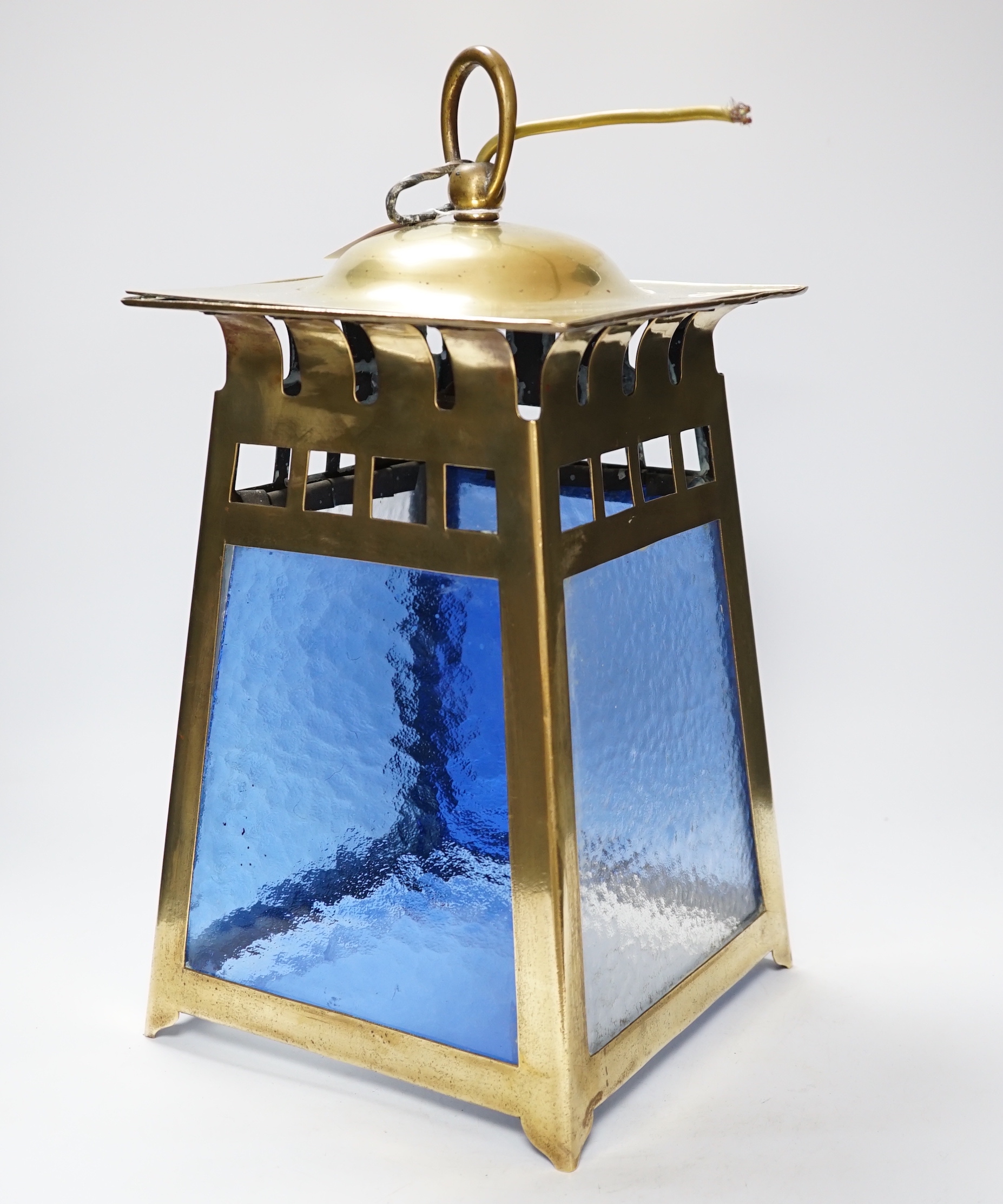 An Arts & Crafts brass and coloured hanging lantern, bought from Liberty’s, 44cm high